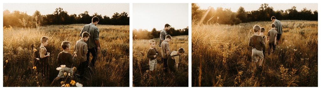 Fun family session with dad walking into field with his sons in suspender shorts Towne Park Family outdoor session fine art