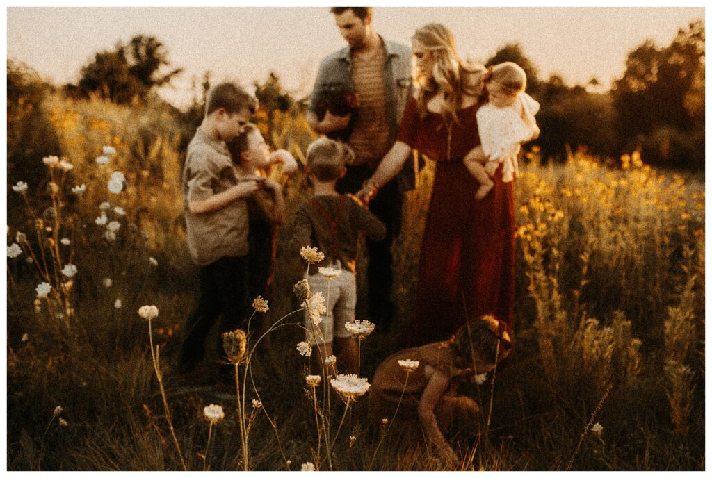 out of focus shot at family session in Wildflower field Missouri O'fallon