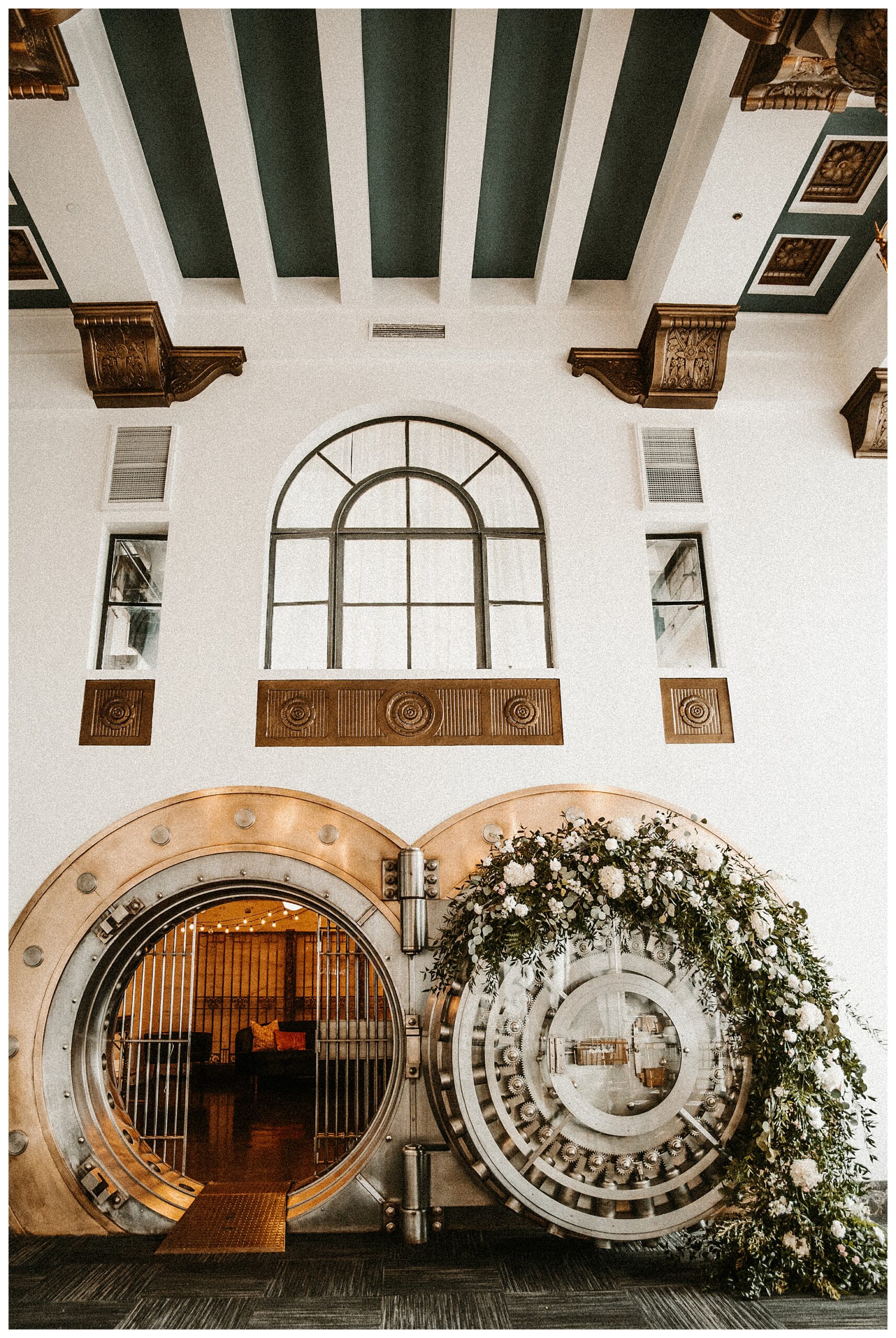 The Noble Missouri decorated vault with greenery and flowers STL wedding photographer