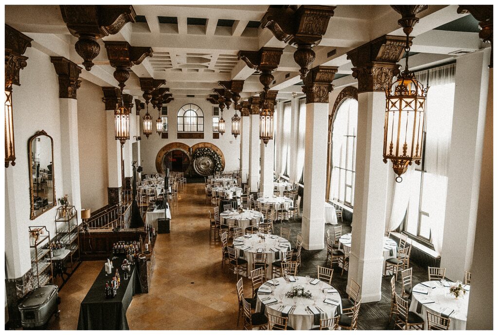 the Vault decorated with flowers room overview of the Noble old Bank turned wedding venue in St. Louis Missouri wedding photographer